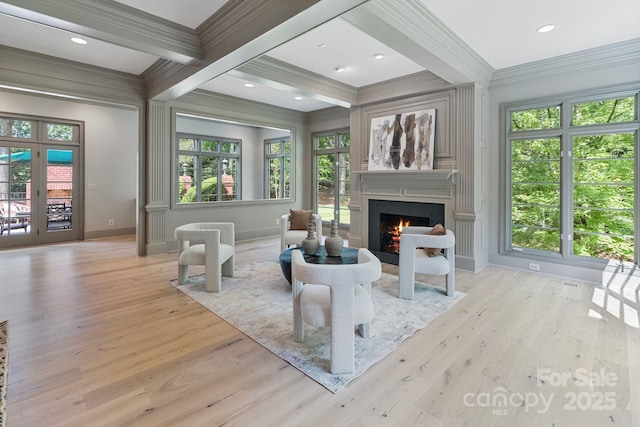 4920 Parview Dr S, Charlotte, NC 28226 - living area with ornamental molding, baseboards, a warm lit fireplace, beamed ceiling, and healthy amount of natural light