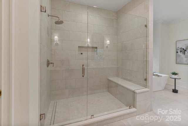4920 Parview Dr S, Charlotte, NC 28226 - full bath with a soaking tub, a shower stall, baseboards, ornamental molding, and tile patterned floors