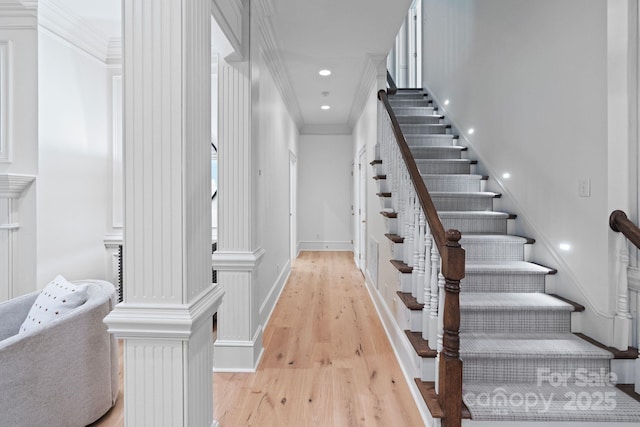 4920 Parview Dr S, Charlotte, NC 28226 - staircase featuring crown molding, wood finished floors, baseboards, and recessed lighting