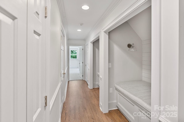 4920 Parview Dr S, Charlotte, NC 28226 - hallway featuring light wood-style floors, ornamental molding, recessed lighting, and baseboards