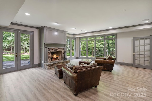 4920 Parview Dr S, Charlotte, NC 28226 - living area featuring crown molding, french doors, baseboards, light wood-style flooring, and recessed lighting