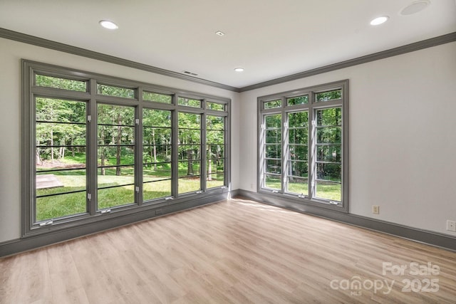 4920 Parview Dr S, Charlotte, NC 28226 - unfurnished room with crown molding, wood finished floors, recessed lighting, and baseboards