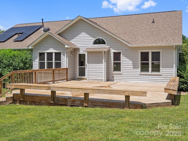 1028 Swaying Oats Dr, York, SC 29745 - back of property featuring a shingled roof, a yard, and a wooden deck