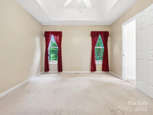 1028 Swaying Oats Dr, York, SC 29745 - unfurnished room with carpet floors, a raised ceiling, and ceiling fan