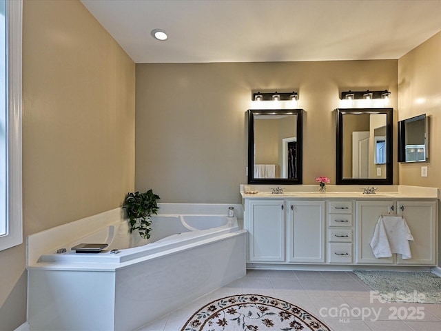 410 Deer Brush Ln, Waxhaw, NC 28173 - full bathroom featuring tile patterned flooring, a bath, and double vanity