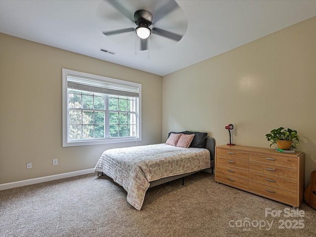 410 Deer Brush Ln, Waxhaw, NC 28173 - carpeted bedroom featuring baseboards and a ceiling fan