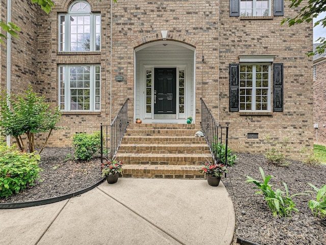 410 Deer Brush Ln, Waxhaw, NC 28173 - view of exterior entry featuring brick siding