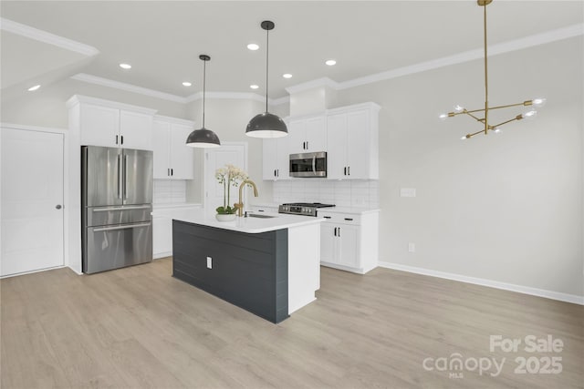 5946 Ardrey Kell Rd, Charlotte, NC 28277 - kitchen with stainless steel appliances, a sink, a chandelier, tasteful backsplash, and light countertops