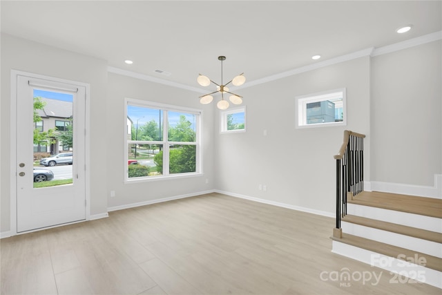 5946 Ardrey Kell Rd, Charlotte, NC 28277 - unfurnished living room featuring ornamental molding, a chandelier, light wood finished floors, baseboards, and stairs