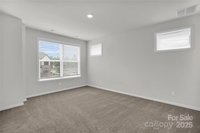 5946 Ardrey Kell Rd, Charlotte, NC 28277 - carpeted spare room featuring baseboards