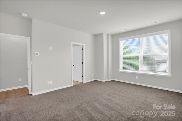 5946 Ardrey Kell Rd, Charlotte, NC 28277 - carpeted empty room with baseboards