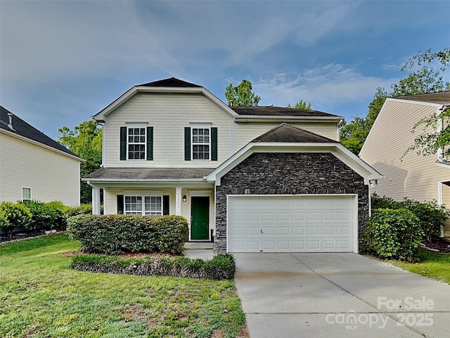 3711 Green Pasture Rd, Charlotte, NC 28269 - traditional-style house with an attached garage, stone siding, driveway, and a front lawn