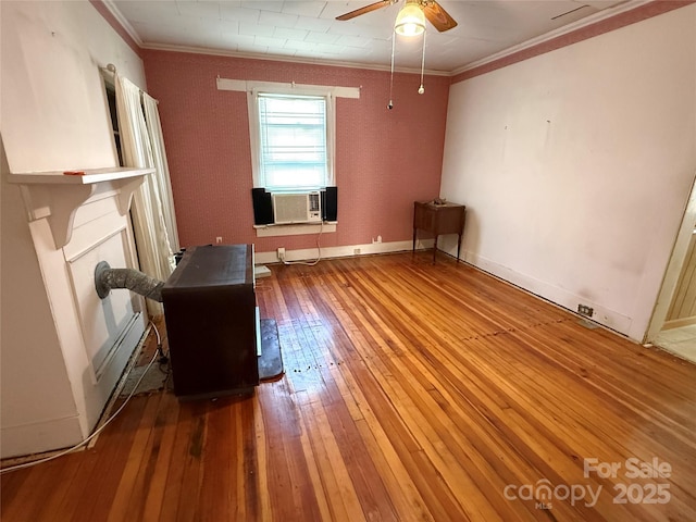 unfurnished living room with crown molding, hardwood / wood-style floors, a ceiling fan, and cooling unit