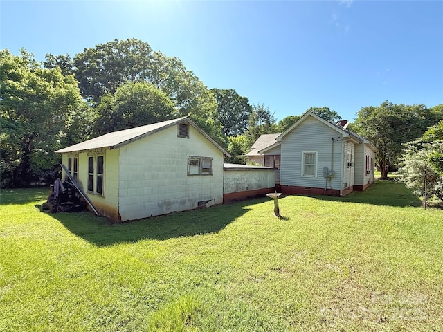 view of property exterior featuring a yard