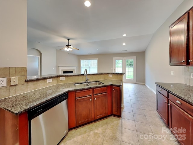 4006 Lawrence Daniel Dr, Matthews, NC 28104 - kitchen with dishwasher, a sink, ceiling fan, tasteful backsplash, and dark stone countertops