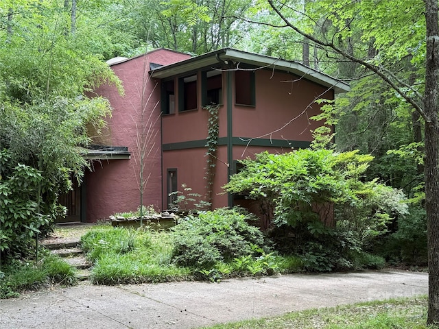 view of home's exterior with stucco siding