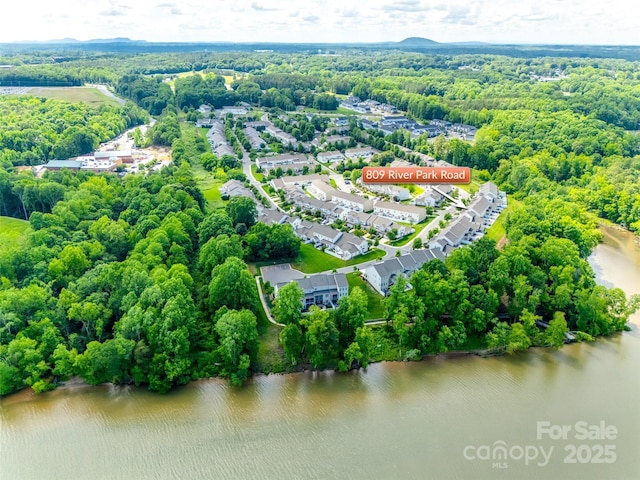 809 River Park Rd, Belmont, NC 28012 - drone / aerial view of a nearby body of water and a heavily wooded area