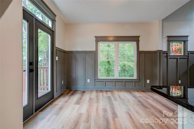 600 S Cline Ave, Newton, NC 28658 - entrance foyer with a decorative wall, light wood-type flooring, and wainscoting