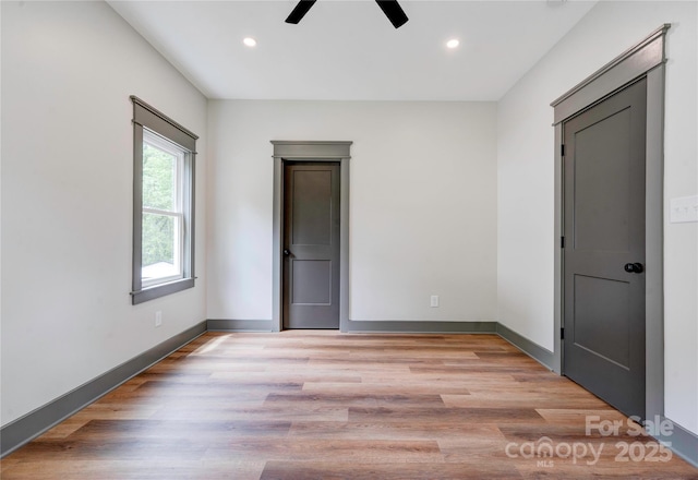 600 S Cline Ave, Newton, NC 28658 - unfurnished bedroom featuring recessed lighting, baseboards, light wood finished floors, and ceiling fan