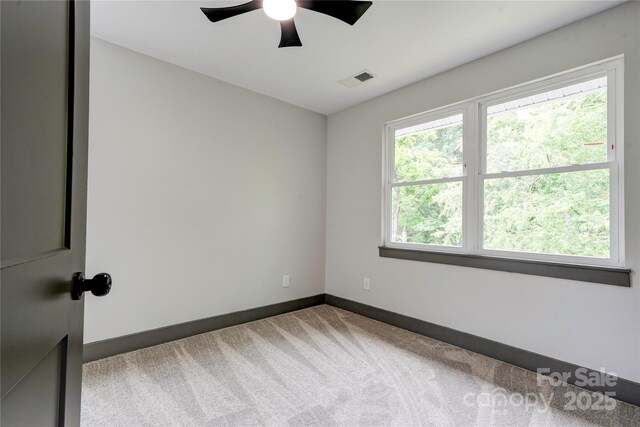 600 S Cline Ave, Newton, NC 28658 - carpeted spare room featuring a ceiling fan and baseboards