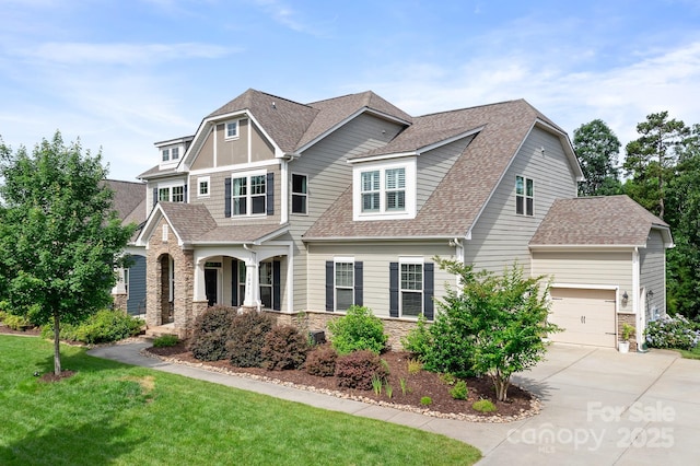 10911 Skymont Dr, Huntersville, NC 28078 - craftsman inspired home with stone siding, concrete driveway, a shingled roof, a front yard, and an attached garage