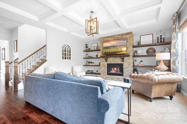 10911 Skymont Dr, Huntersville, NC 28078 - living area with coffered ceiling, a fireplace, stairway, beamed ceiling, and healthy amount of natural light