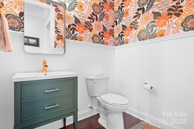 10911 Skymont Dr, Huntersville, NC 28078 - bathroom featuring baseboards, toilet, vanity, and wood finished floors