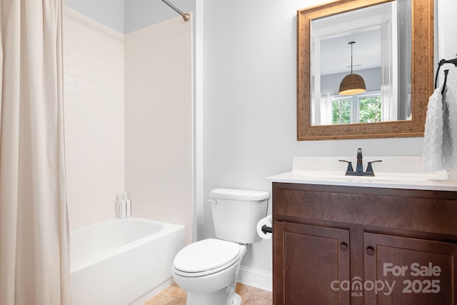 10911 Skymont Dr, Huntersville, NC 28078 - bathroom with vanity, toilet, shower / bath combo with shower curtain, baseboards, and tile patterned flooring