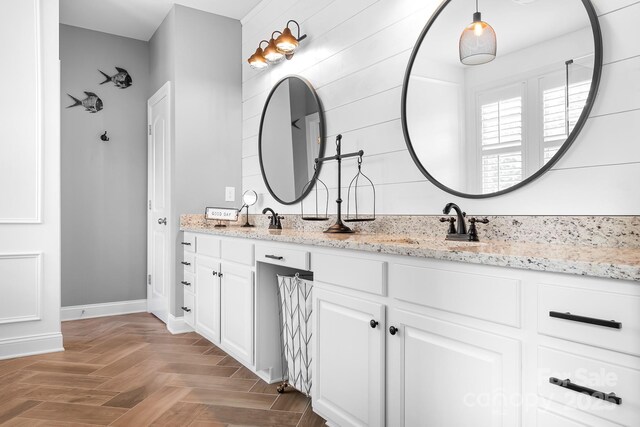 10911 Skymont Dr, Huntersville, NC 28078 - bathroom with double vanity and baseboards
