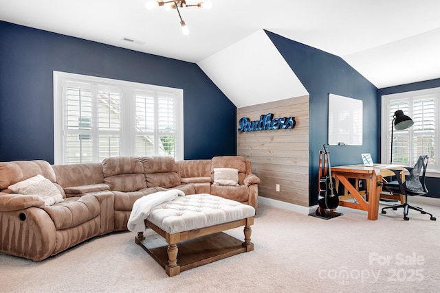 10911 Skymont Dr, Huntersville, NC 28078 - carpeted living room featuring lofted ceiling, an office area, and baseboards