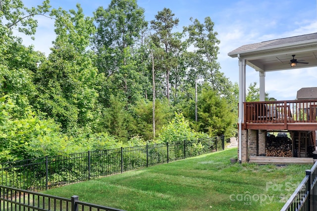 10911 Skymont Dr, Huntersville, NC 28078 - view of yard featuring a ceiling fan and a wooden deck