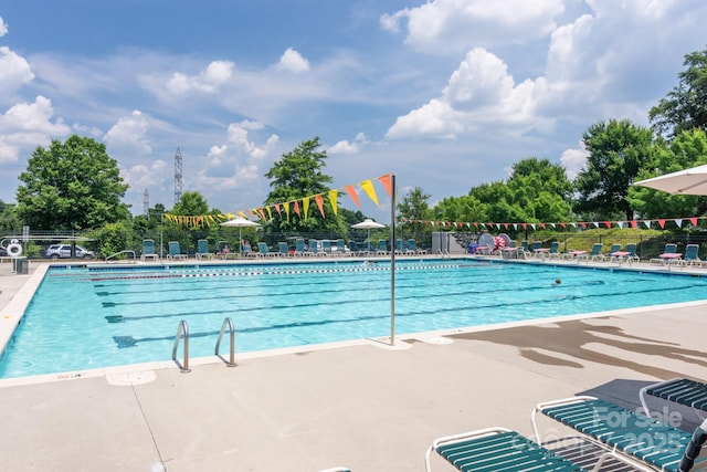 10911 Skymont Dr, Huntersville, NC 28078 - community pool with a patio area