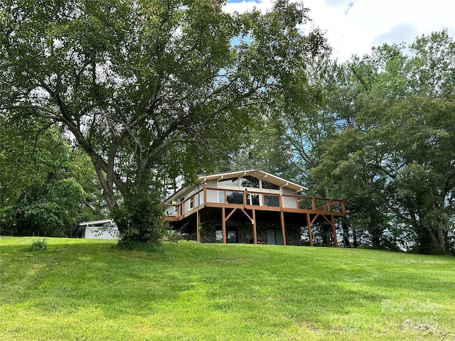 61 Magnolia Dr, Canton, NC 28716 - back of house featuring a wooden deck, a lawn, and stone siding