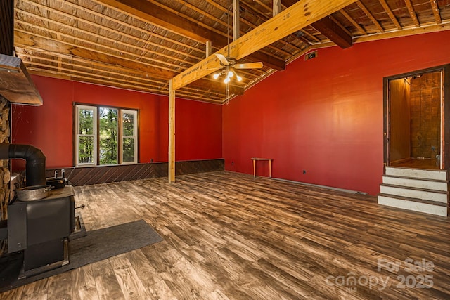61 Magnolia Dr, Canton, NC 28716 - living area with a wood stove, ceiling fan, wood finished floors, and stairs