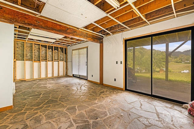 61 Magnolia Dr, Canton, NC 28716 - basement with stone flooring and baseboards