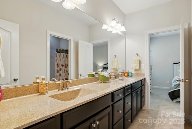 161 Leaning Tower Dr, Mooresville, NC 28117 - ensuite bathroom with double vanity and tile patterned floors