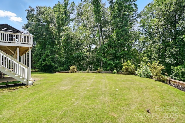 161 Leaning Tower Dr, Mooresville, NC 28117 - view of grassy yard with a deck and stairway