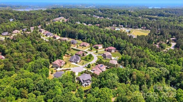 161 Leaning Tower Dr, Mooresville, NC 28117 - view of property location with a forest and nearby suburban area