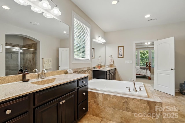 161 Leaning Tower Dr, Mooresville, NC 28117 - ensuite bathroom featuring vanity, a shower stall, a bath, and recessed lighting