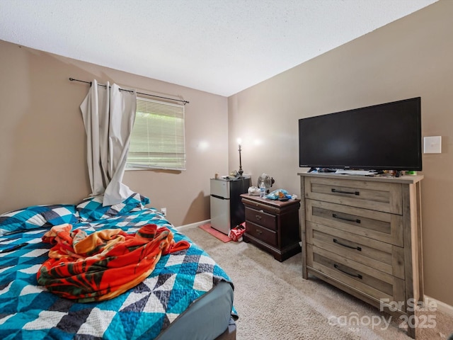 7977 Shady Oak Trl, Charlotte, NC 28210 - bedroom with refrigerator, light carpet, and baseboards