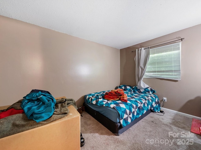 7977 Shady Oak Trl, Charlotte, NC 28210 - bedroom with carpet flooring and baseboards