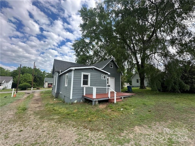 168 Grove St, Mocksville, NC 27028 - back of property with a wooden deck, a lawn, and crawl space