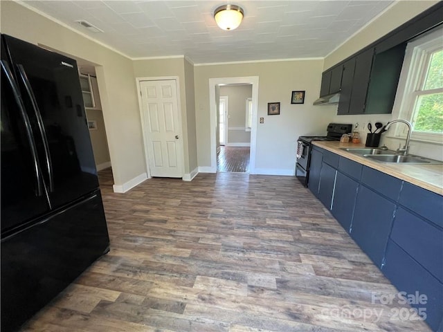 168 Grove St, Mocksville, NC 27028 - kitchen featuring black appliances, a sink, dark wood-type flooring, under cabinet range hood, and light countertops