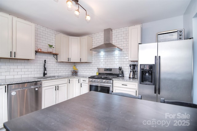 3623 Braden Dr, Charlotte, NC 28216 - kitchen with wall chimney range hood, appliances with stainless steel finishes, a sink, open shelves, and decorative backsplash