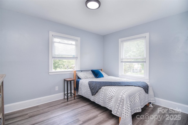 3623 Braden Dr, Charlotte, NC 28216 - bedroom with baseboards and wood finished floors