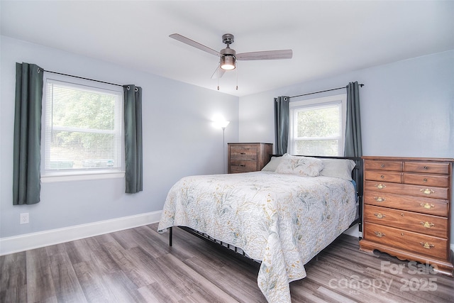 3623 Braden Dr, Charlotte, NC 28216 - bedroom featuring wood finished floors, ceiling fan, and baseboards