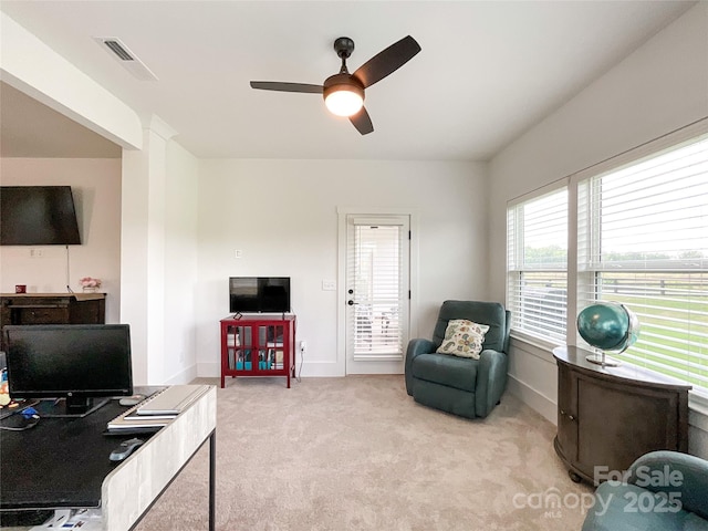office featuring ceiling fan, carpet flooring, and baseboards