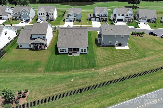 aerial perspective of suburban area with a local golf course