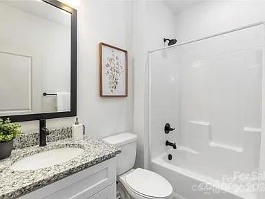 1604 N Main St, Mount Holly, NC 28120 - full bathroom featuring vanity, toilet, and shower / bath combination