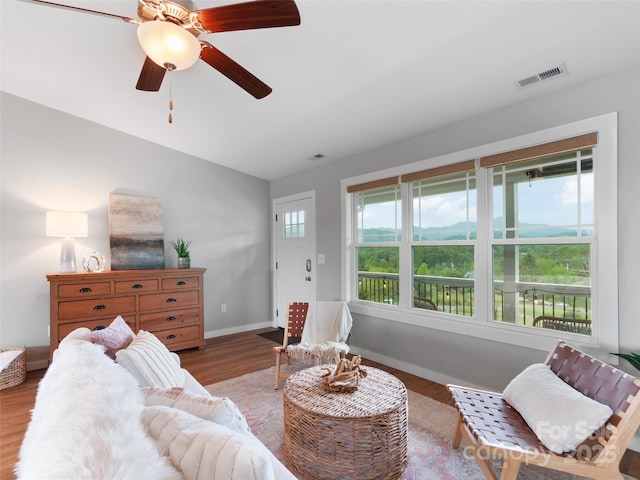 128 Lewis Ln, Candler, NC 28715 - living room featuring wood finished floors, baseboards, and ceiling fan